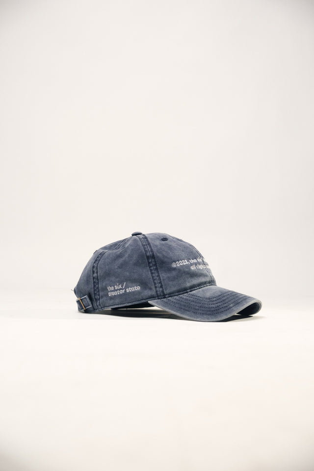 Cap the six creative studio grunge blue