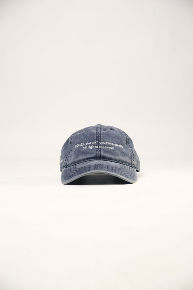 Cap the six creative studio grunge blue